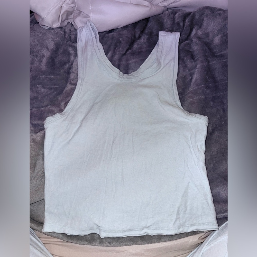 NWT, Light blue sleeveless women’s tank size XS, Fp movement .